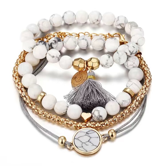 Jewelry - NWT 4pcs Tassel Bracelet Set